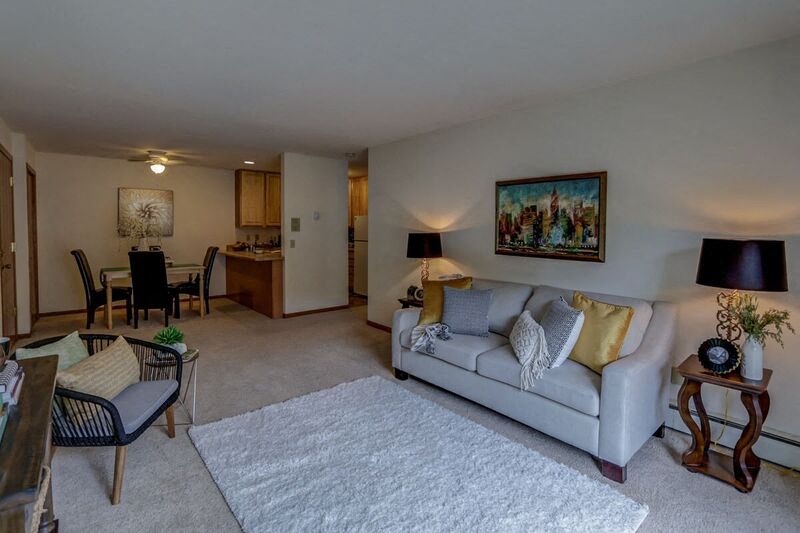 a living room with a couch and a table