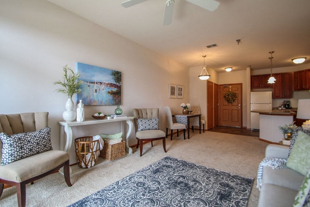 a living room with a dining room and a kitchen