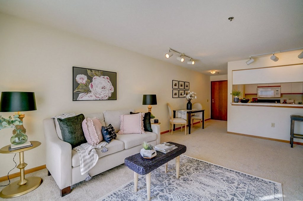 a living room with a couch and a table