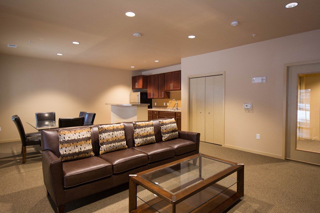 a living room with a couch and a coffee table