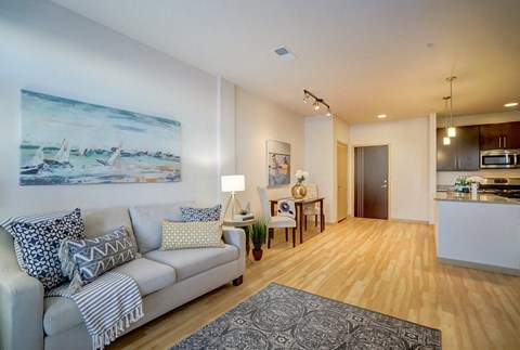 a living room with a couch and a table