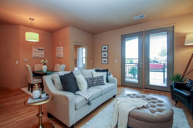 a living room with a couch and a table