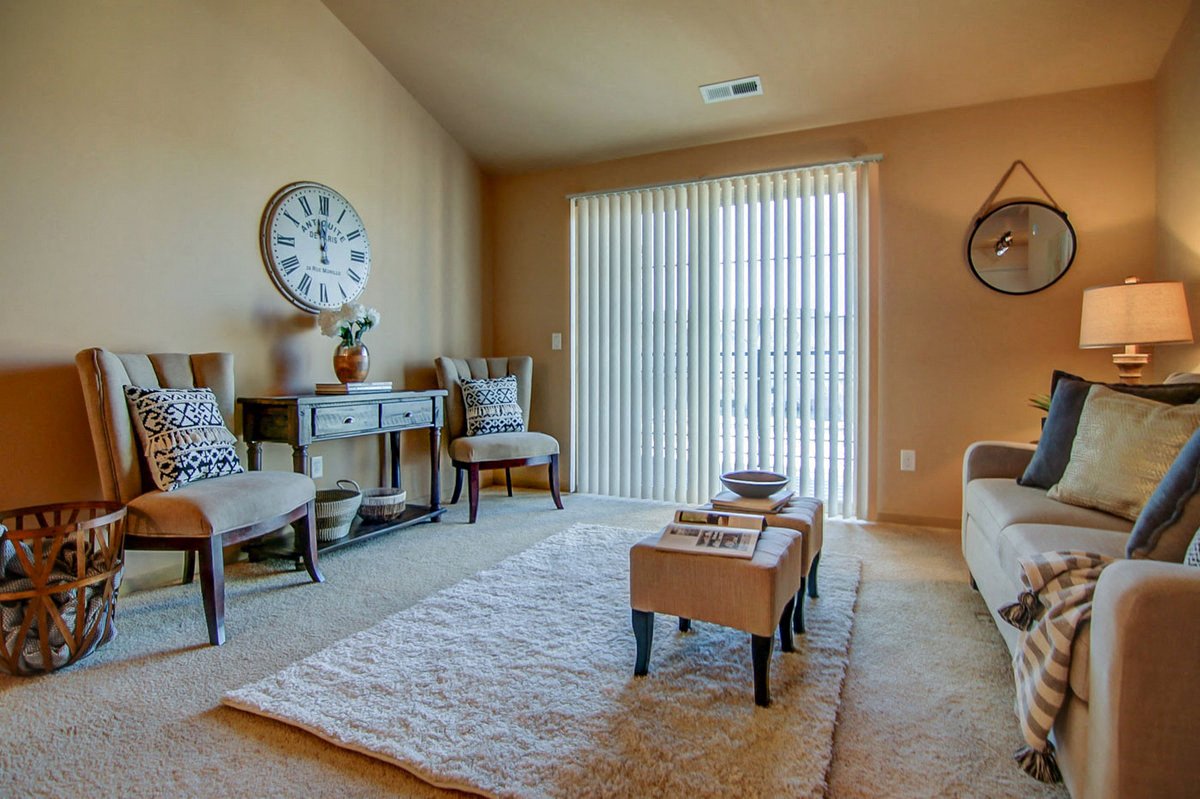 a living room with a couch and a table