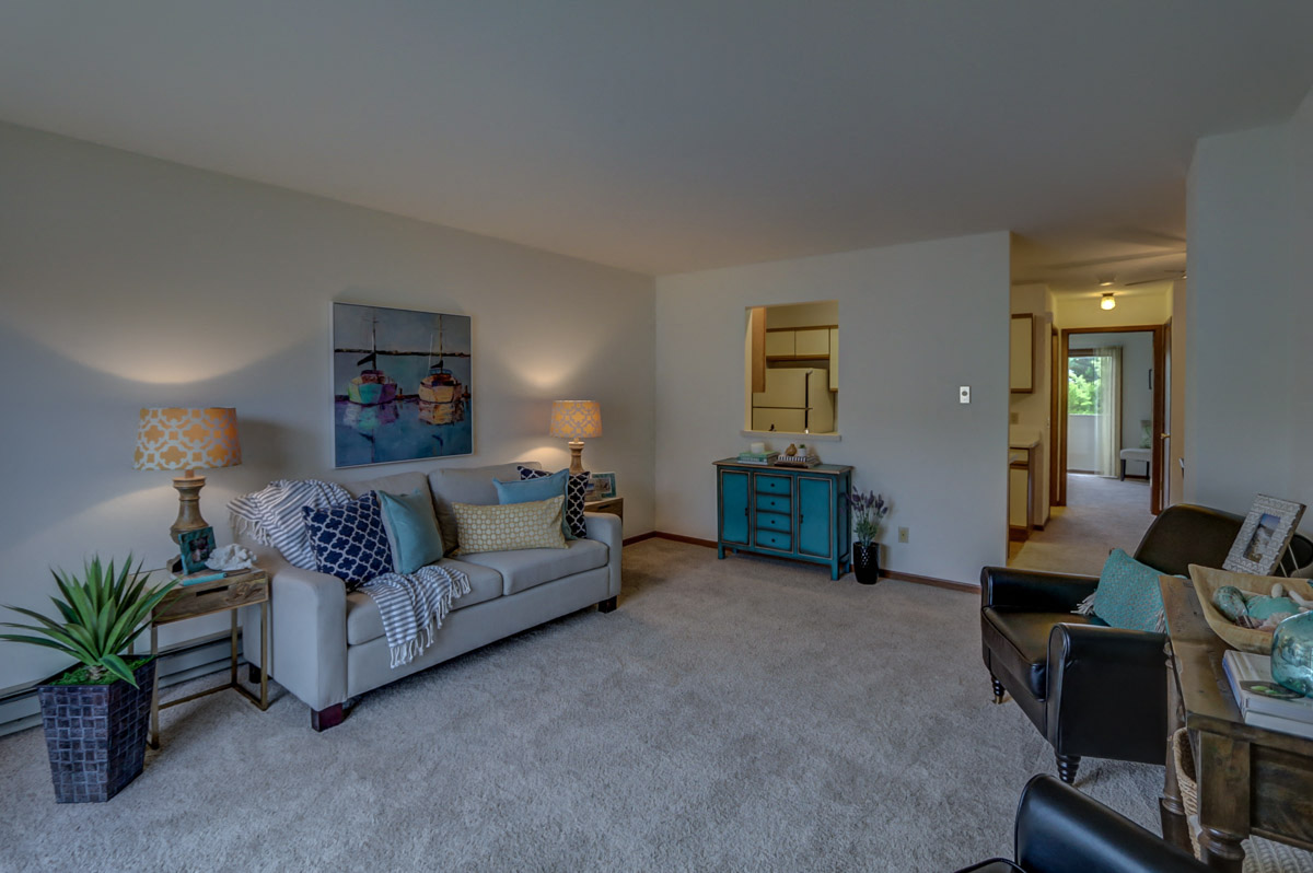 a living room with a couch and a table