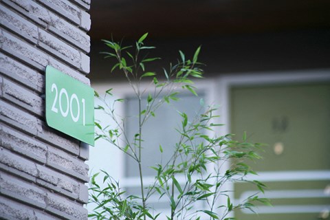 a house with a sign that reads 200 on it