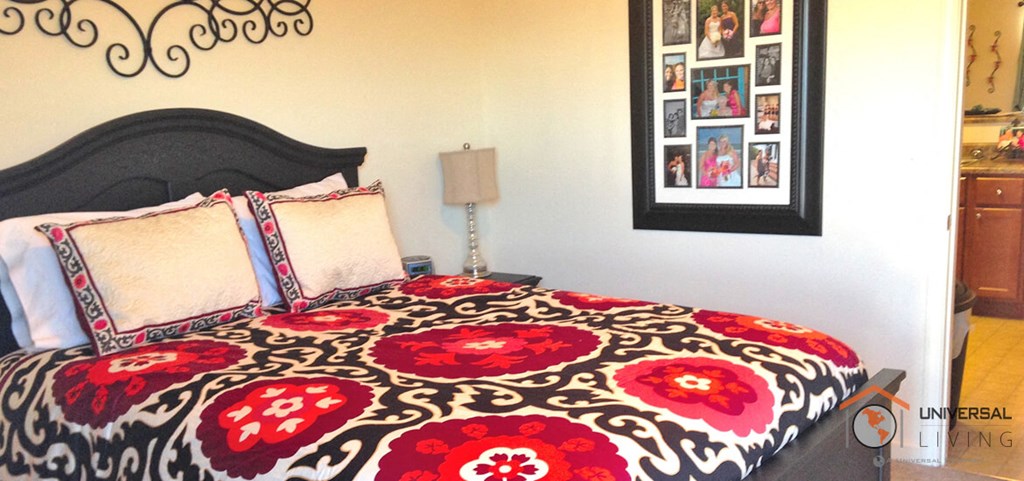 the bedroom has a queen sized bed in it