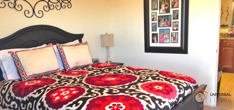 the bedroom has a queen sized bed in it
