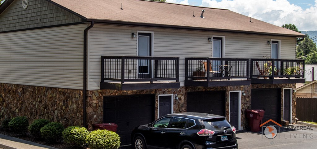 a house with a car parked in front of it