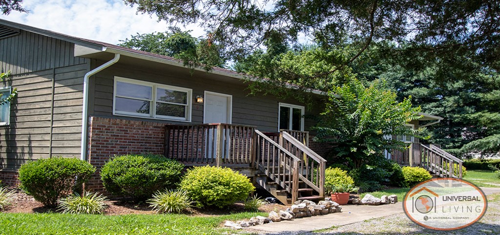 a home with a front porch and stairs