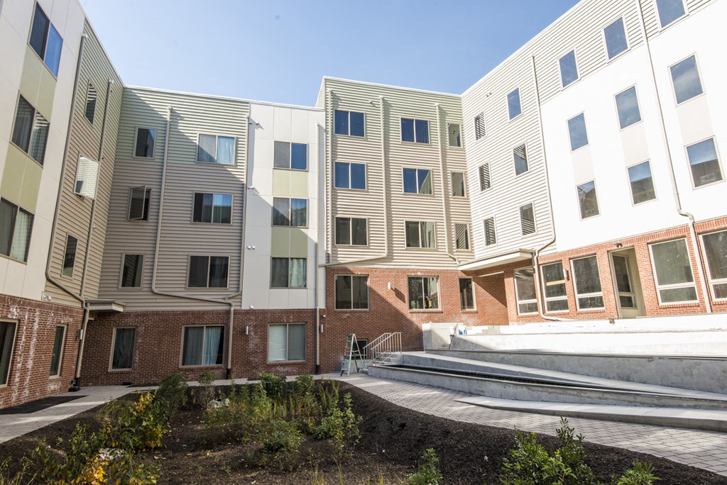 a view of a building with stairs in front of it