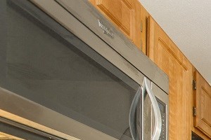 Newly renovated kitchens with stainless steel appliances in select units.