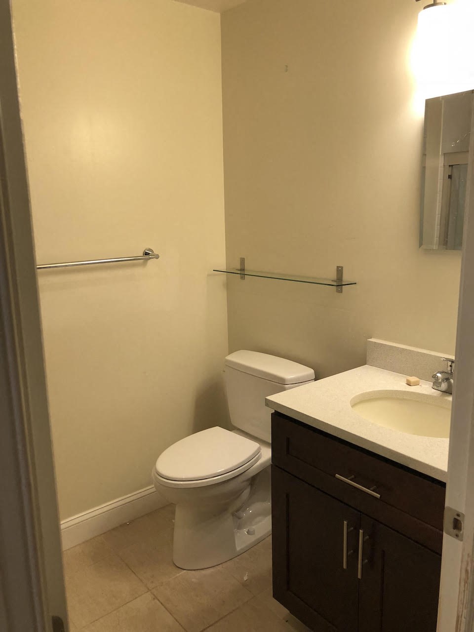 a bathroom with a toilet and a sink