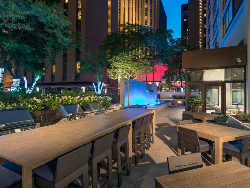 Fire Pit and Grilling Stations for Al Fresco Dining at Columbus Plaza, Chicago, IL