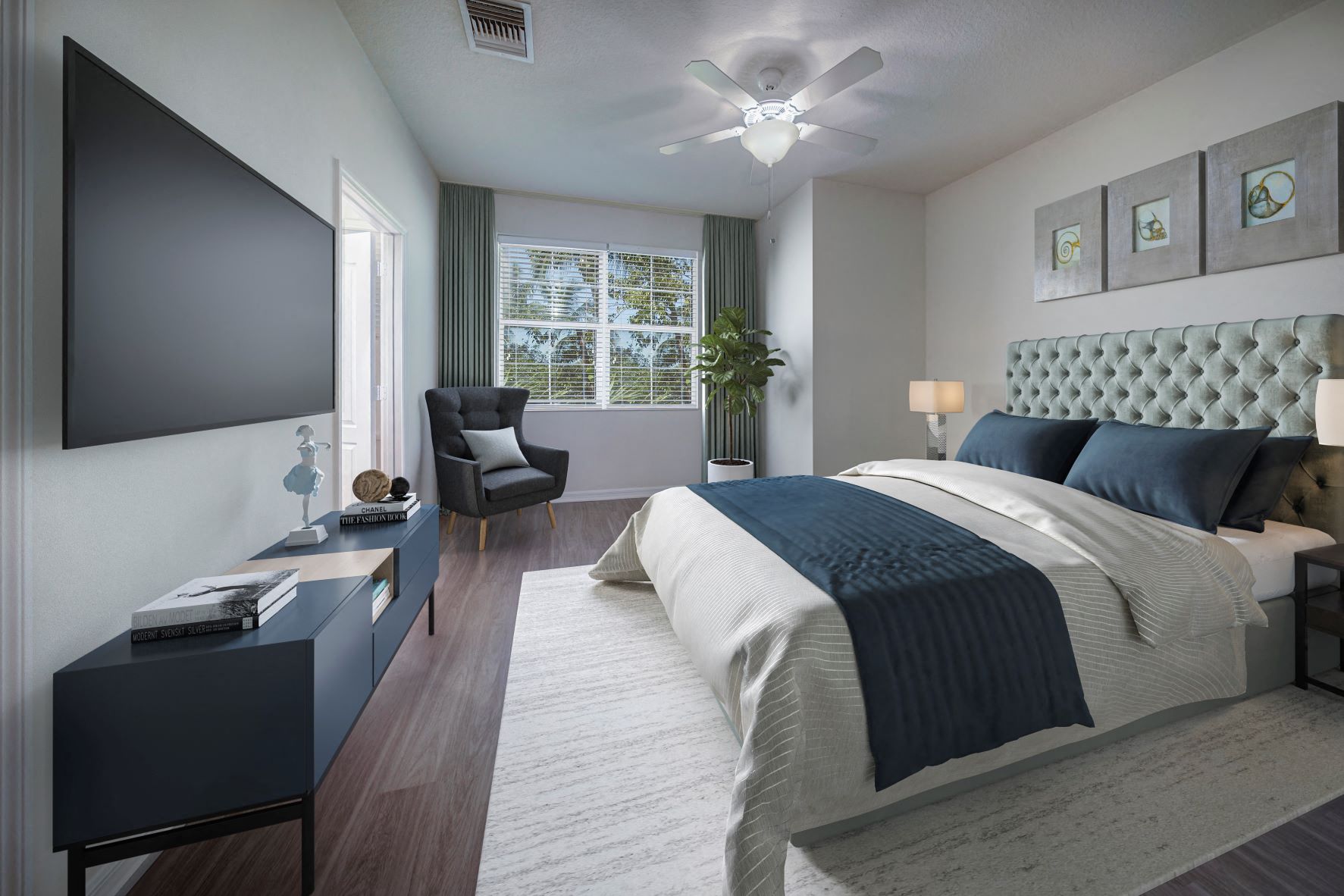 a bedroom with a bed and a ceiling fan