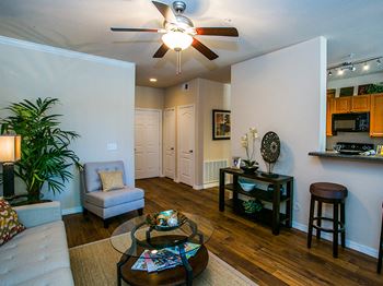 Spacious Living and Dining Room Area with Included Ceiling Fan at Mesa, AZ Apartment 85209