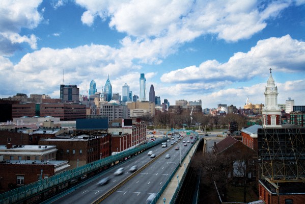 a view of the city from above a highway