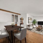 a living room and dining room with a table and chairs