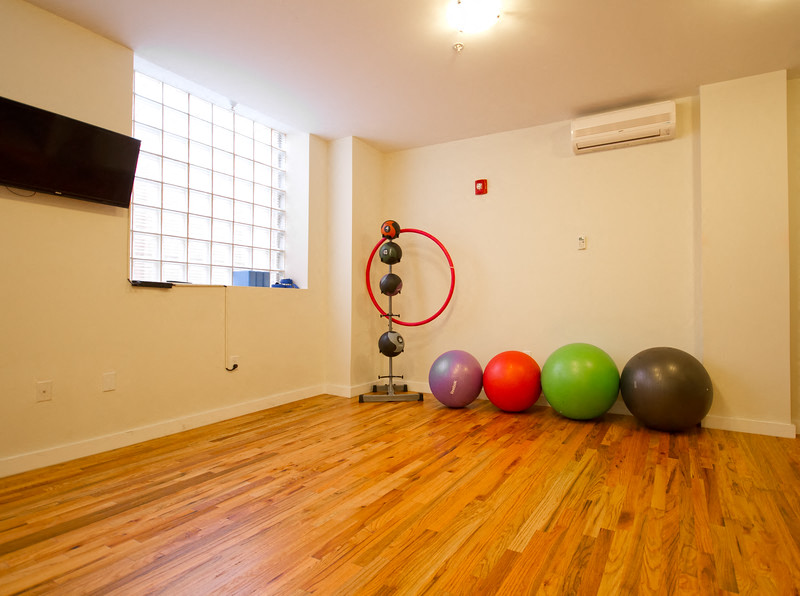 Yoga room with yoga balls and medicine balls