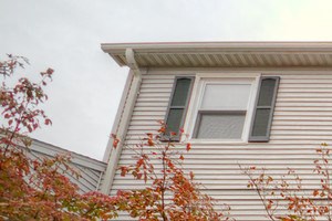 Exterior of building with red picket fence - Photo Gallery 3