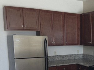 Large kitchen with granite counter tops and stainless steel appliances - Photo Gallery 3