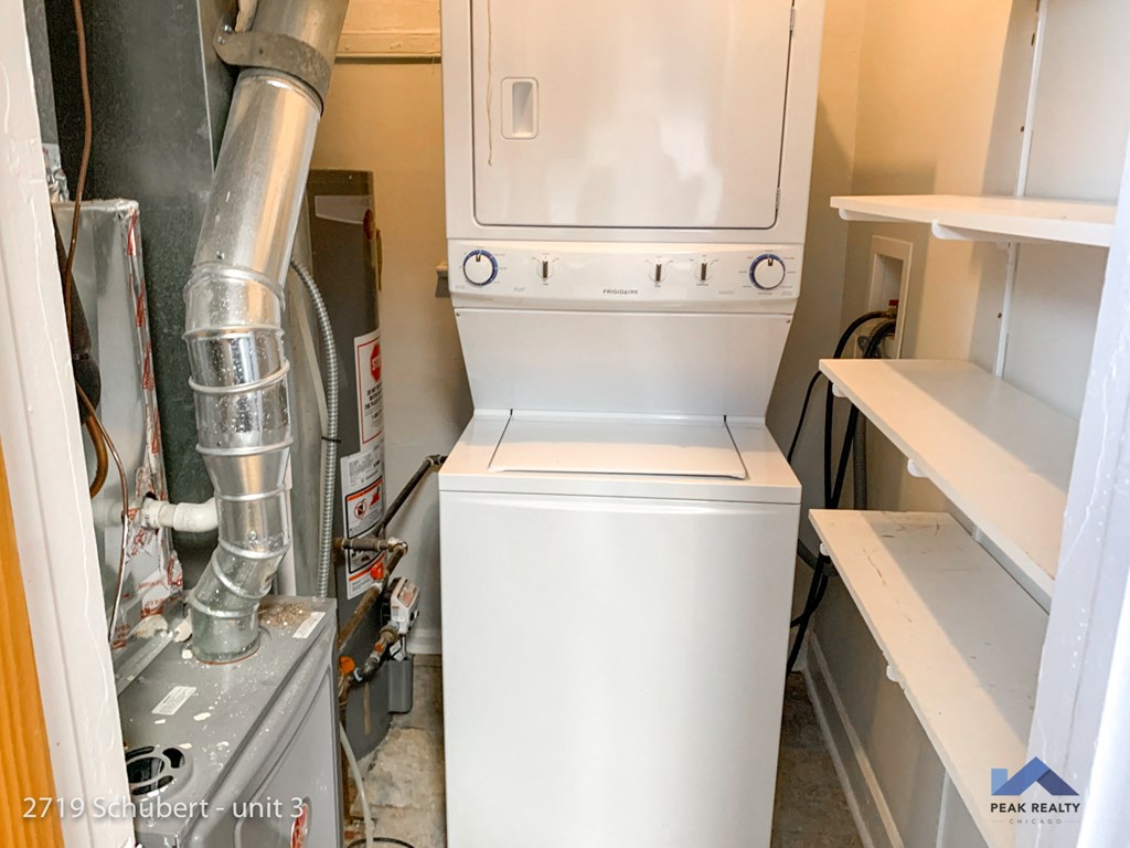 the washer and dryer are installed in the laundry room