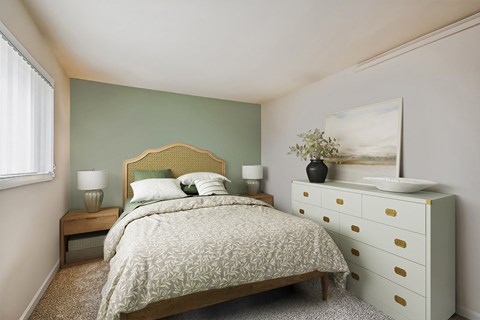 a bedroom with a bed and a dresser