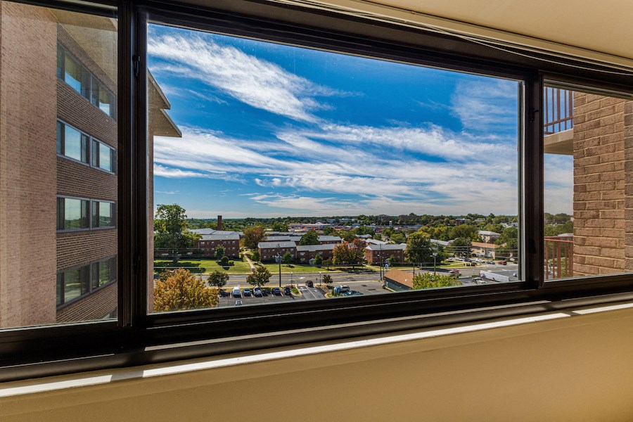 a view of the city from a window of a building
