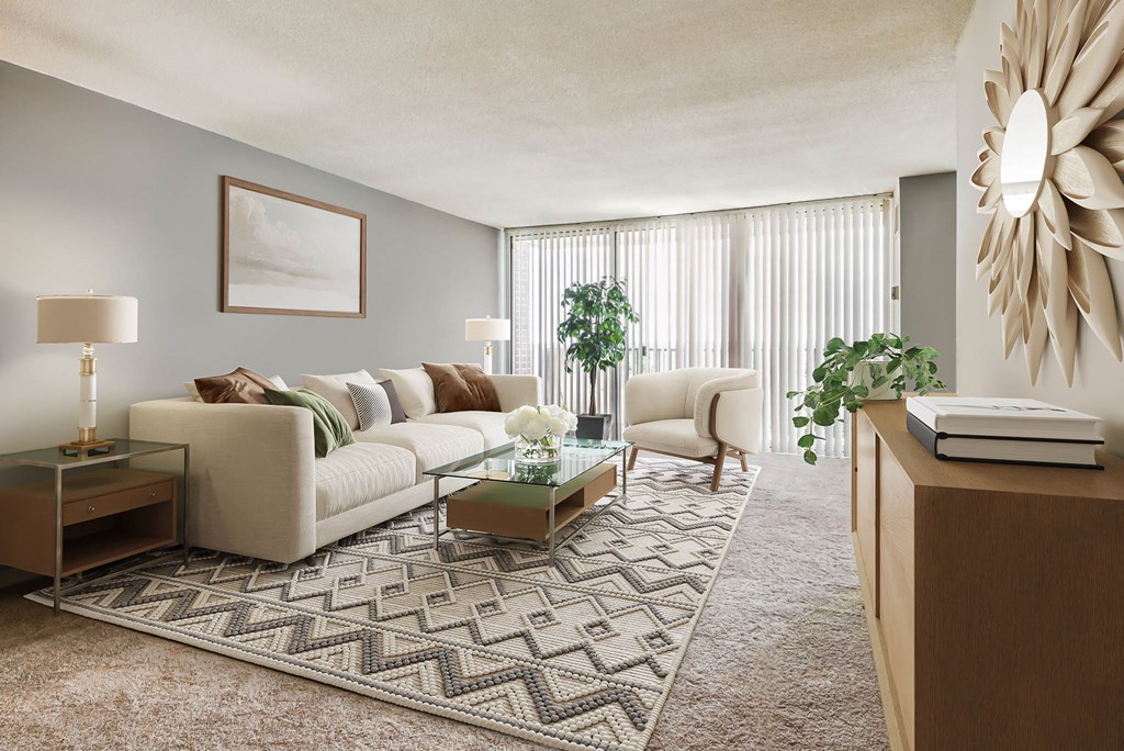 a living room with a white couch and a rug