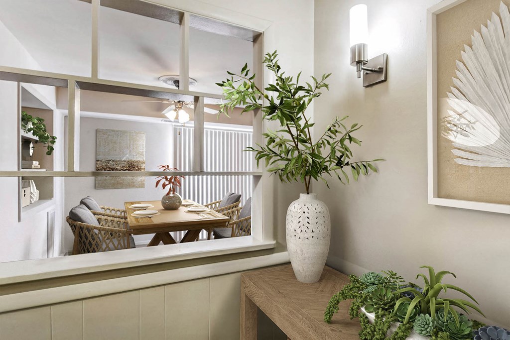 a dining room with a table and a large window