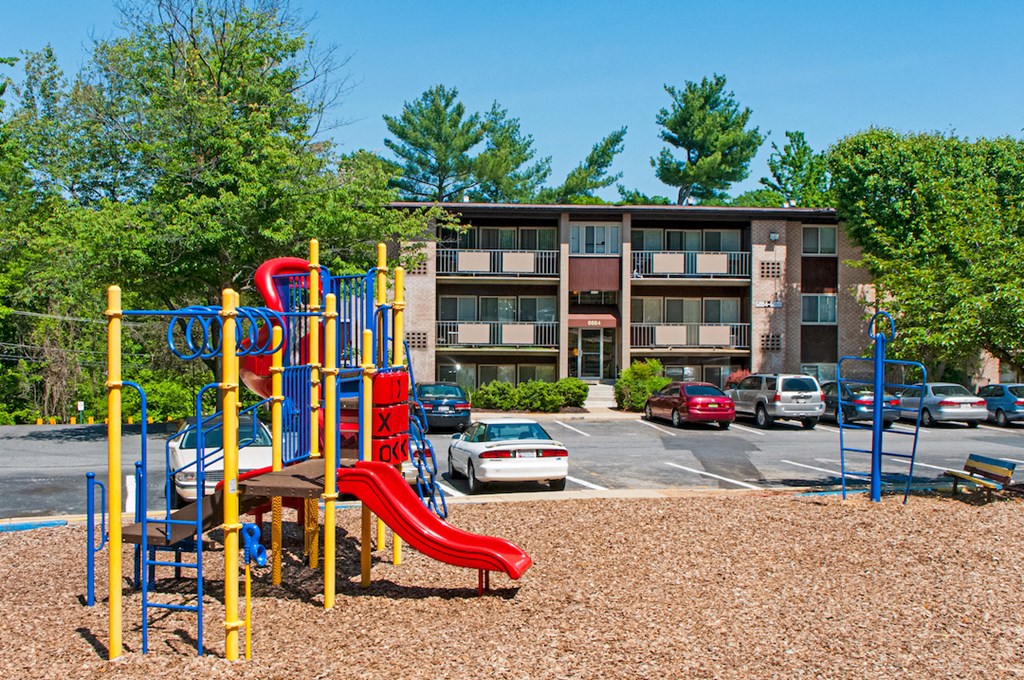 a playground at the enclave at green valley apartments in green valley