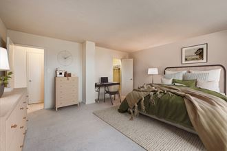a bedroom with a bed and a dresser
