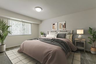 an empty bedroom with a bed and a window