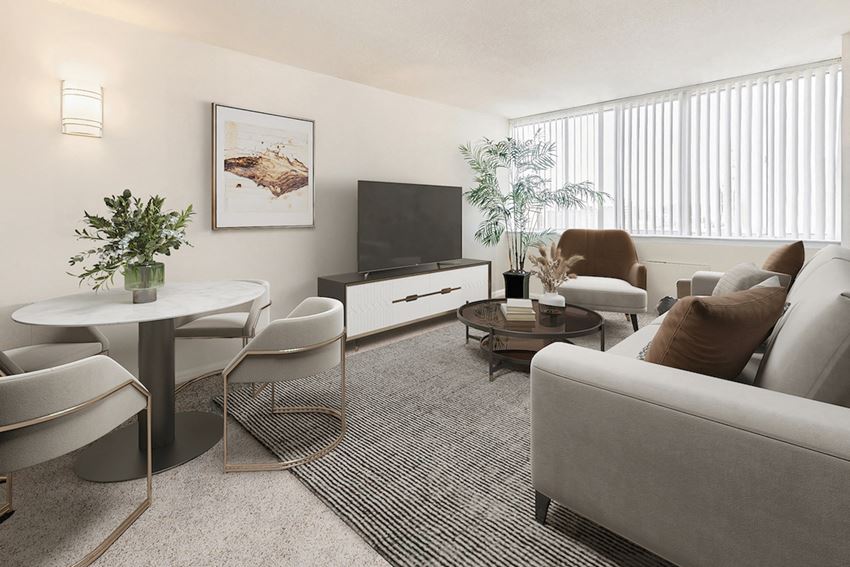 a living room with a couch and a table and a television