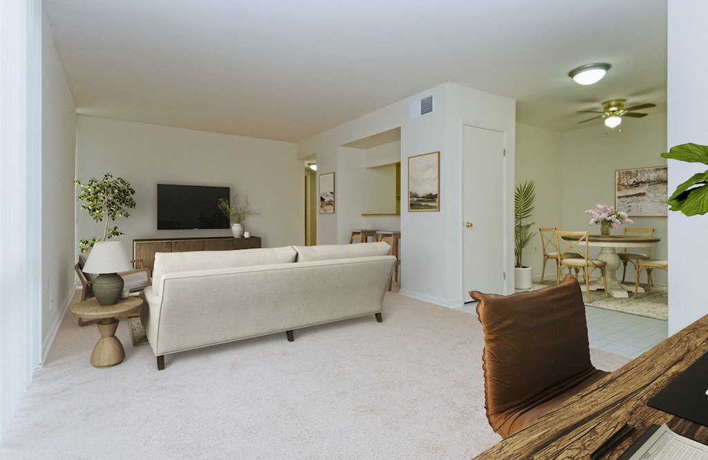 a living room with a couch and a tv