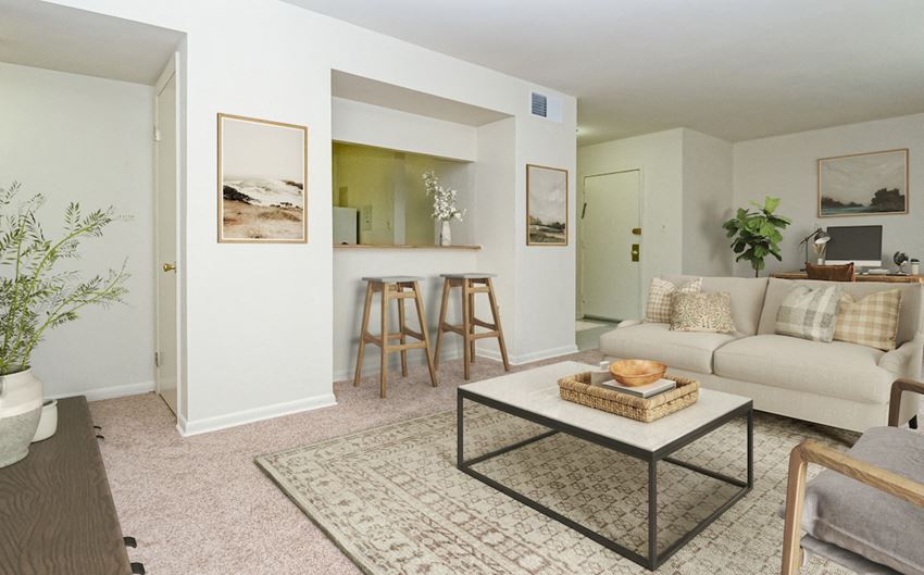 a living room with a couch and a coffee table