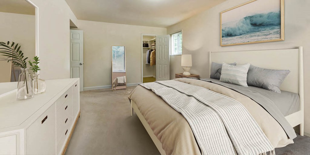 a bedroom with a bed and a closet