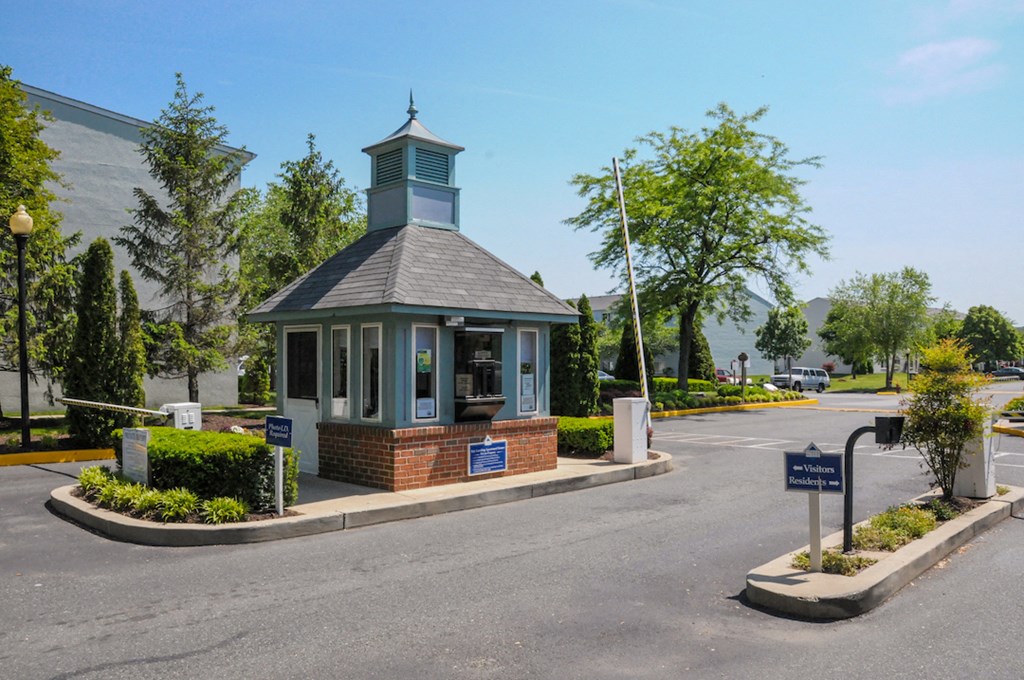 the gazebo on the corner of a street in a parking lot