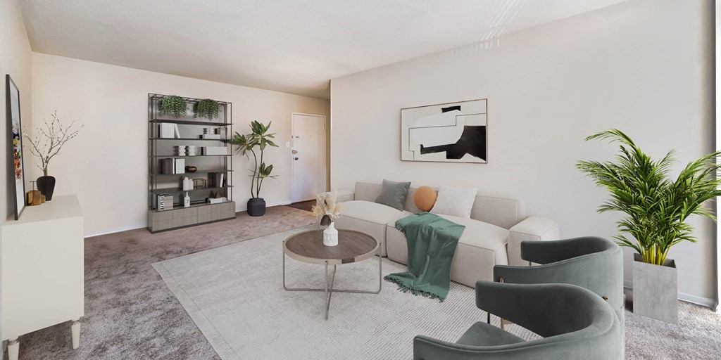 a living room with a white couch and a coffee table