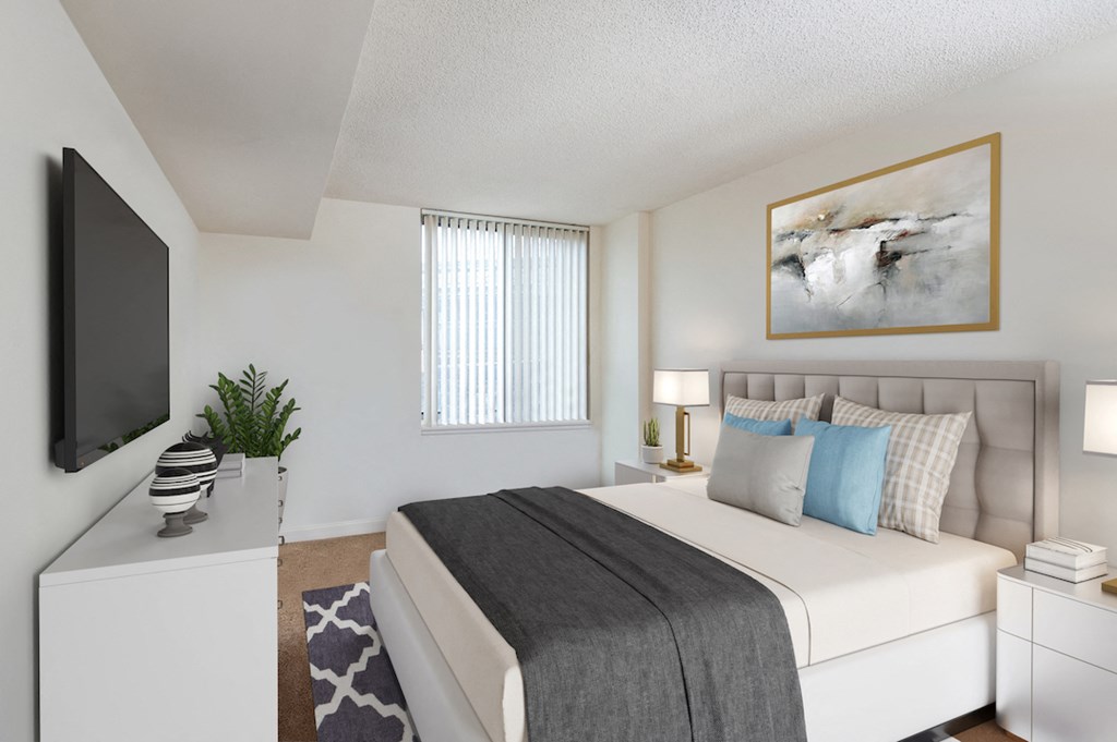 the preserve at ballantyne commons bedroom with bed and tv