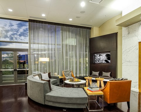 a living room with a couch and a table