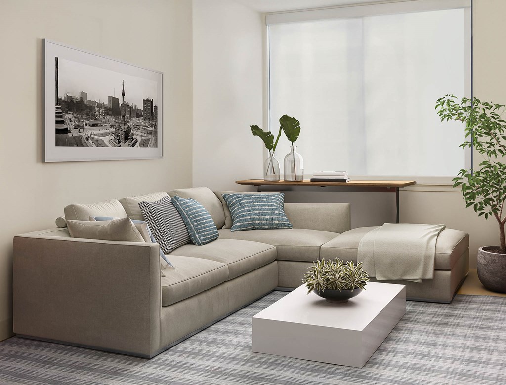 a living room with a couch and a coffee table