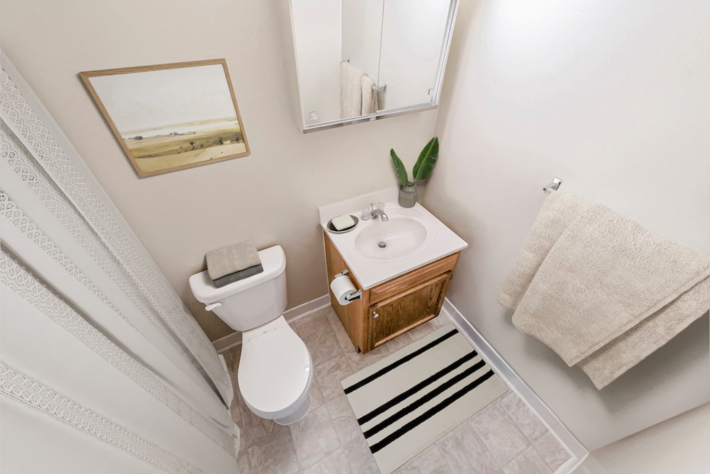 a small bathroom with a toilet and a sink