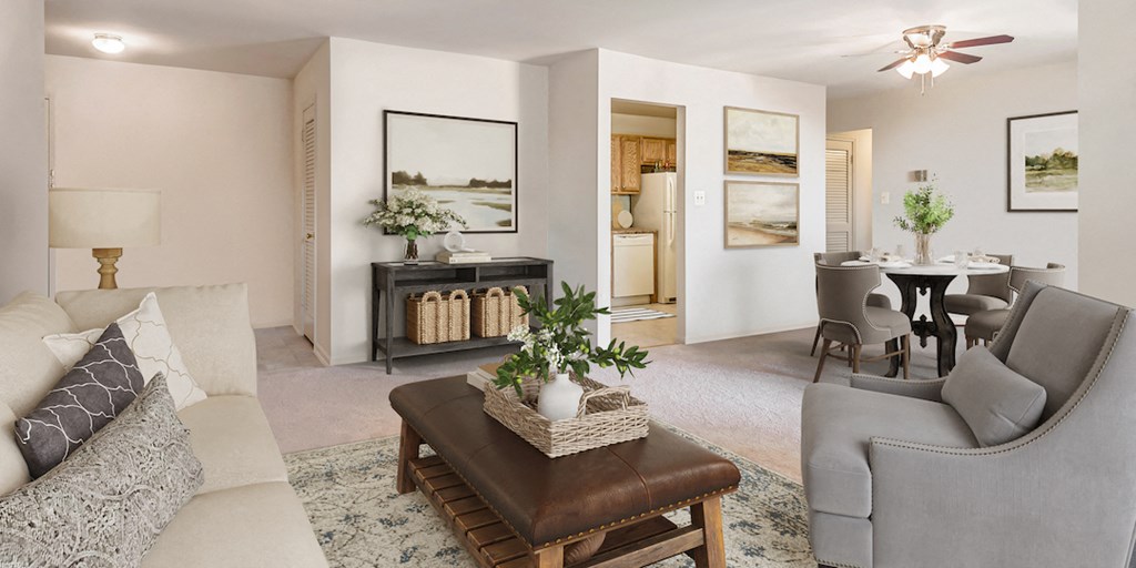 a living room and dining room with a table and chairs