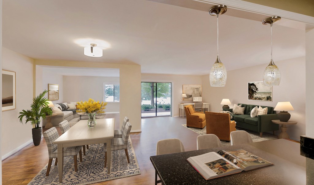 a living room and dining room with a table and chairs