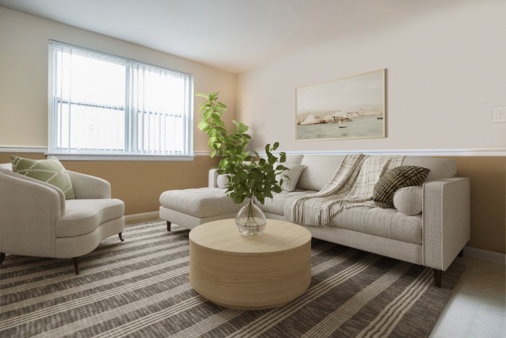 a living room with a couch and a coffee table
