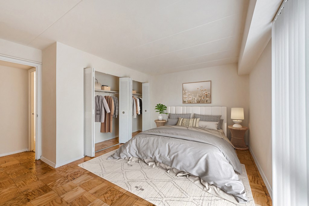 a bedroom with a bed and a closet