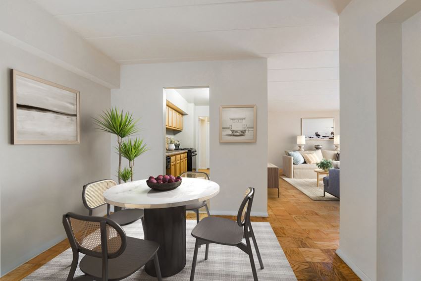 a dining room with a table and chairs and a living room