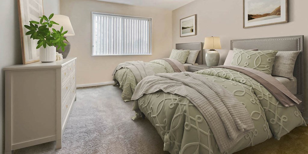 a bedroom with two beds and a dresser