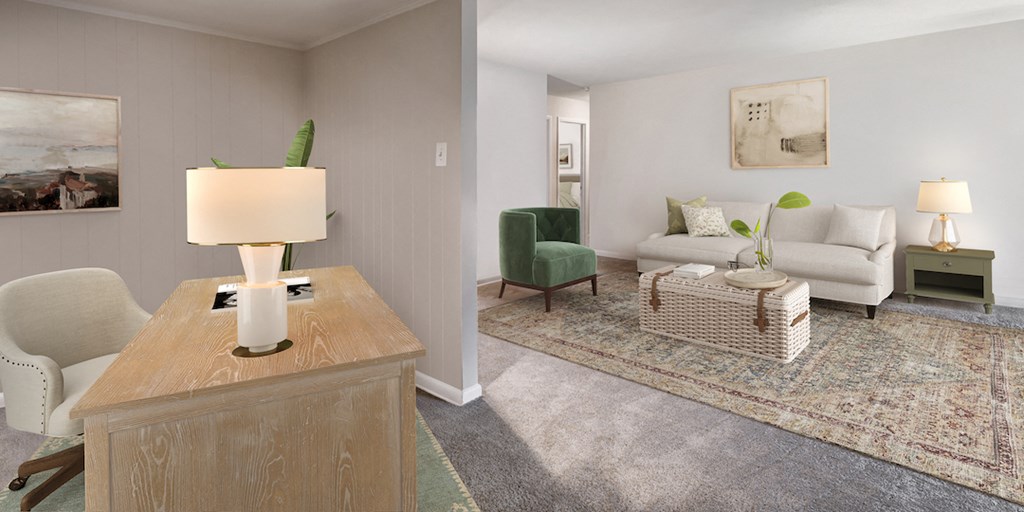 a living room with white furniture and a table with a lamp