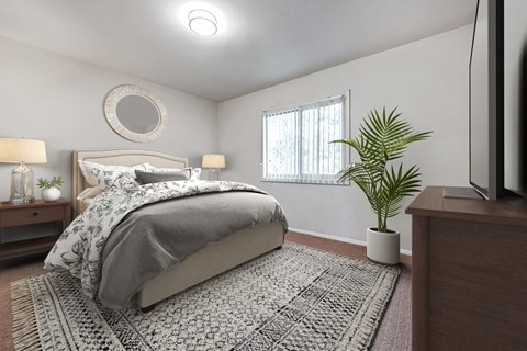 a bedroom with a bed and a potted plant